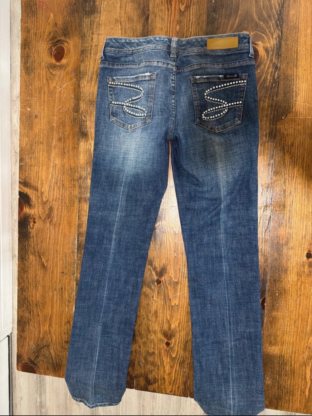 Seven7 Medium Blue Bootcut Jeans with Studded Pocket Accents